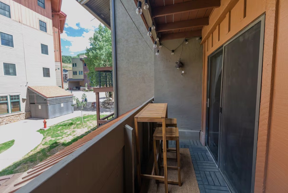Private covered balcony with mountain views at ski in ski out 11 Emmons Road Crested Butte